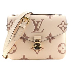 Louis Vuitton Pochette Metis Bicolor Monogram Empreinte Giant at