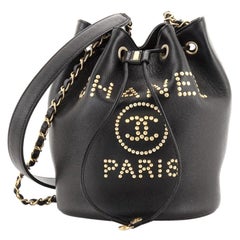 Chanel Deauville Drawstring Bucket Bag Studded Caviar Medium