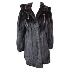 Unused mink fur coat with a hood size 10