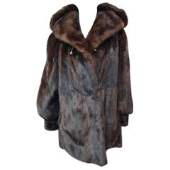 Unused demi buff mink fur coat with a hood size 10