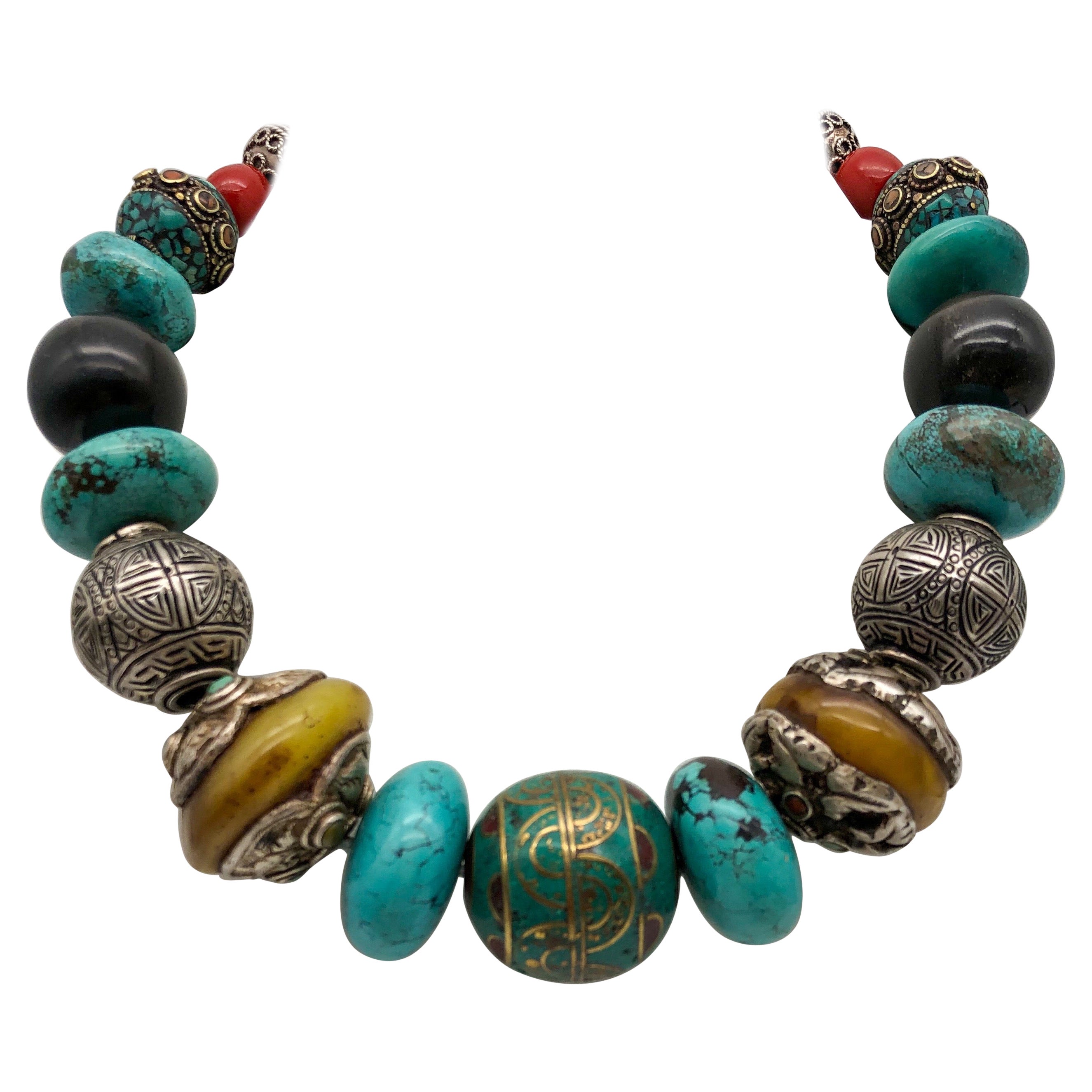 A.Jeschel Powerful Turquoise necklace with a large center bead of Tibetan. 