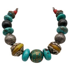 A.Jeschel Powerful Turquoise necklace with a large center bead of Tibetan.