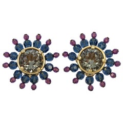 Pendientes con clip de cristal Swarovski chapados en oro rosa apagado azul dorado Star Burst