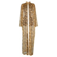 Long coat in gold lace 