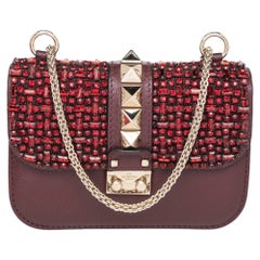 Braune Leder-Mini-Glam Lock-Umhängetasche