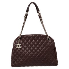 Chanel  Sac bowler Just Mademoiselle en cuir caviar matelassé de taille moyenne