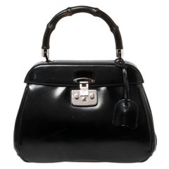 Gucci Gucci Medium Lady Lock Top Handle Bag aus schwarzem glänzenden Leder