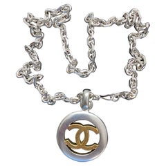 Chanel Vintage -  Necklace with CC pendant in Gold and Silver coated Metal