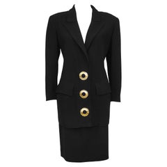 1980s Valentino Black Skirt Suit with Sliced Back and Large Gold Buttons 