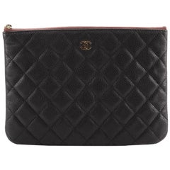 Chanel O Case Clutch Quilted Caviar Small