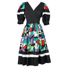 Vintage Wrap dress in black cotton jersey and flower printed skirt Jacqueline Lechat