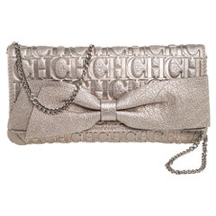 Carolina Herrera Metallic Light Gold Monogram Leather Bow Clutch