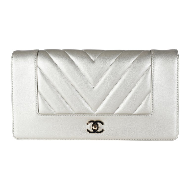 Chanel Gold Chevron Quilted Sheepskin Mademoiselle Vintage Clutch For Sale  at 1stDibs