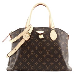 Louis Vuitton Rivoli Handtasche Monogramm Segeltuch MM