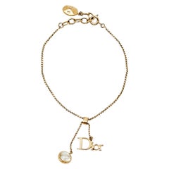 Dior Gold Tone Logo & Crystal Charm Bracelet