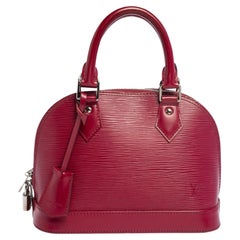 Used Louis Vuitton Fuchsia Epi Leather Alma BB Bag