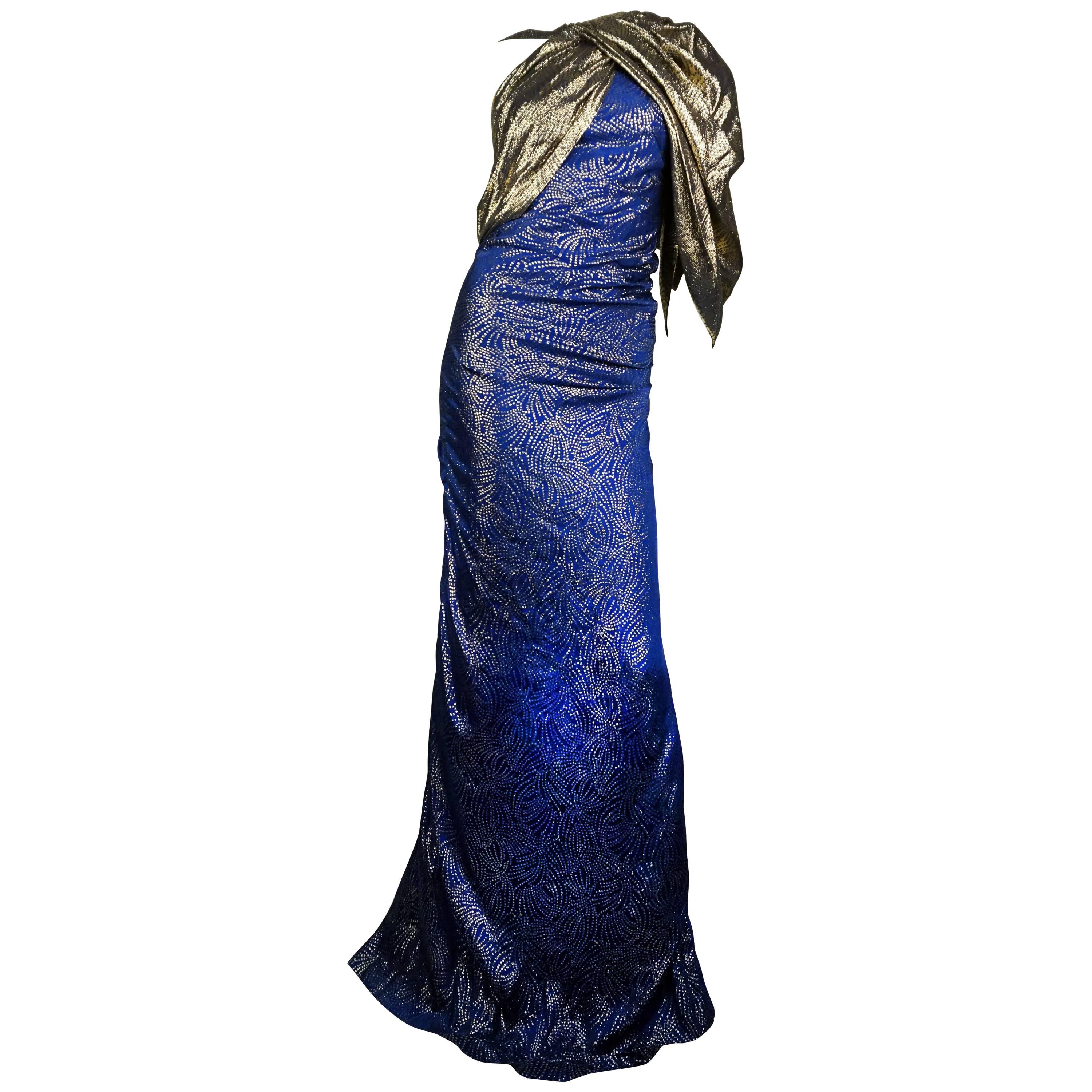 1980s Lame Jacqueline De Ribes One Shoulder Mermaid Gown

This fabulous Cerulian and Gold brocade lame gown displays a dramatic one should attatched to a beautifully designed halter that displays subtle rouche elements along the bodice. 

There