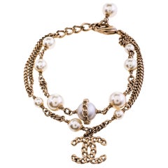 Chanel Gold Tone Pearl Double Chain CC Charm Bracelet
