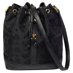 MCM Black Canvas and Leather Drawstring Bucket Bag at 1stDibs | mcm bucket  bag black, mcm black bucket bag, mcm bucket bag black price