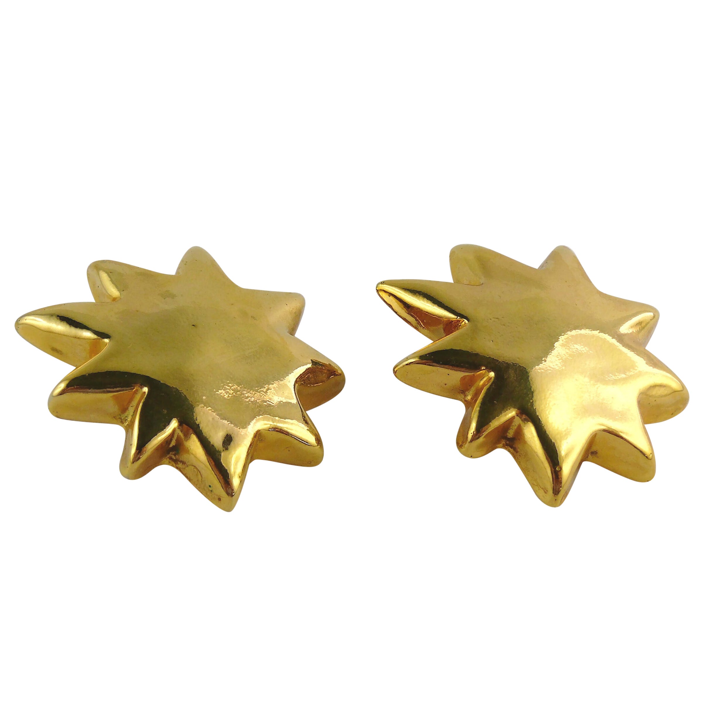 Pendientes de clip Christian Lacroix Vintage de resina dorada Iconic Starburst en venta