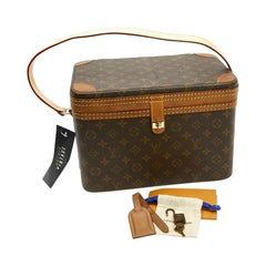 LOUIS VUITTON Vintage-Schmucktasche aus Segeltuch und Naturleder mit Monogramm