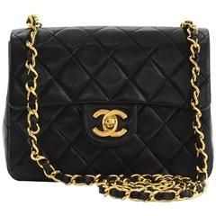 1990s Chanel Black Quilted Lambskin Vintage Mini Flap Bag