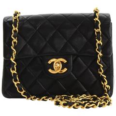 1990's Chanel Black Quilted Lambskin Vintage Mini Flap Bag