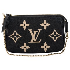 New Louis Vuiton Black Embossed Mini Pochette Bag