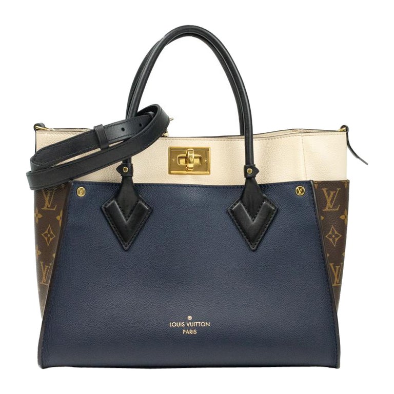 On my side leather handbag Louis Vuitton Blue in Leather - 32410373