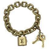LOUIS VUITTON White Gold Padlock and Keys Charm Bracelet at 1stDibs  lv  bracelet with lock, louis vuitton lock bracelet, white gold padlock bracelet