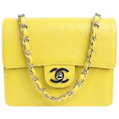 Chanel Quilted Yellow Caviar Leather Flap Bag. 