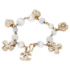 New Chanel Gold Pearl Enamel CC Logo Charm Bracelet