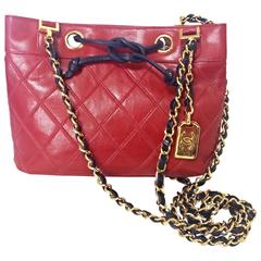 Vintage CHANEL classic mini tote bag in red leather with golden chain and navy 