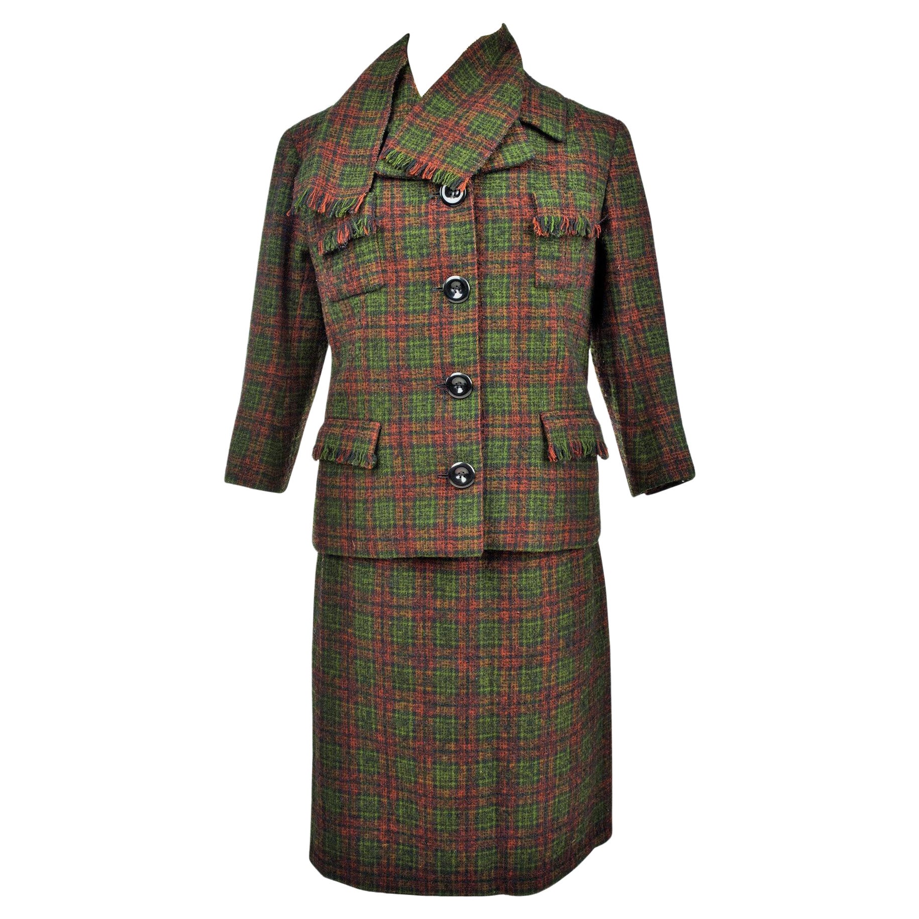 A French Bérénice skirt suit in Woll tartan / Dior pattern - France Circa 1970