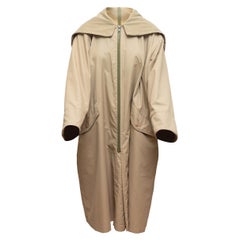 Issey Miyake Imperméable beige surdimensionné à capuche