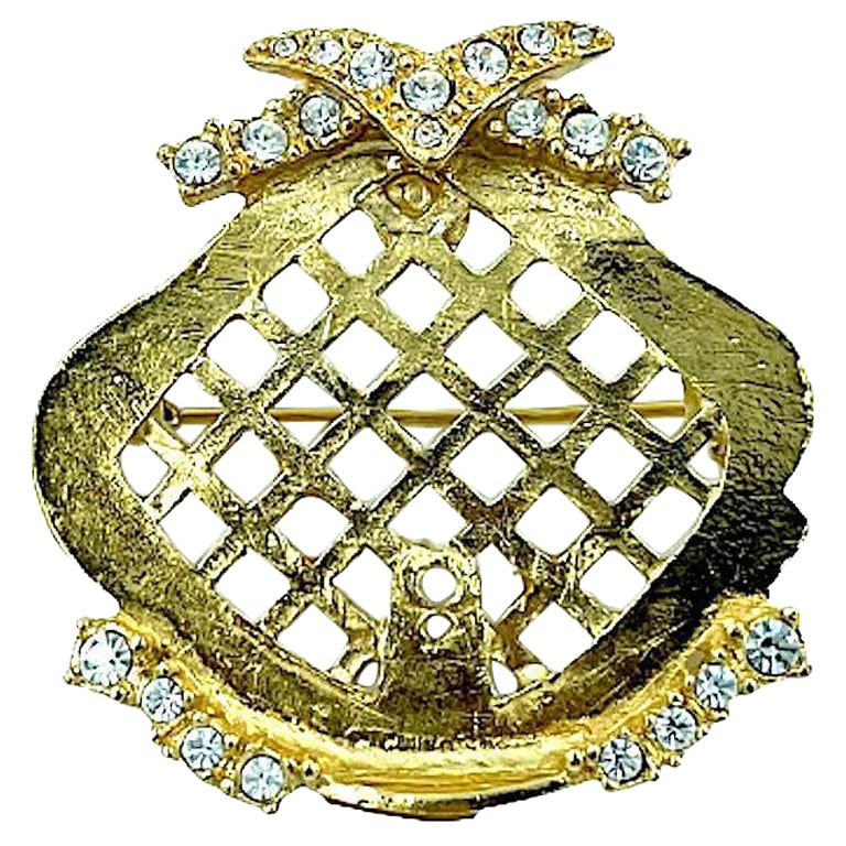 CHRISTIAN DIOR Broche vintage en métal doré