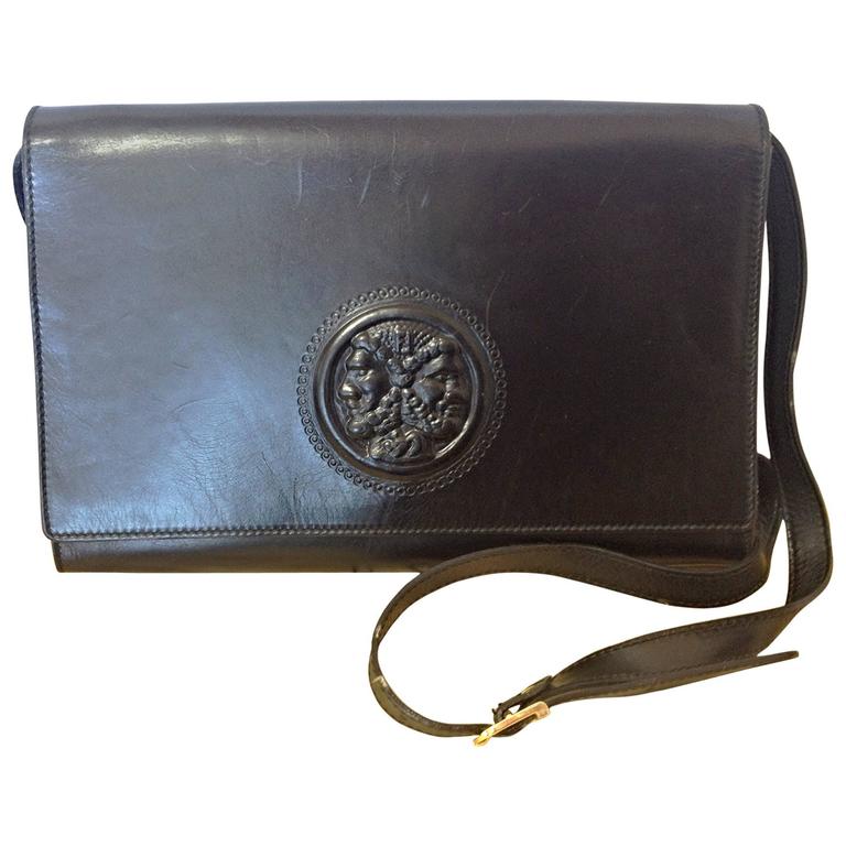 Vintage FENDI black leather shoulder bag, large clutch purse with iconic logo at 1stdibs