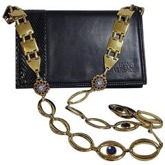 MINT. Vintage Gianni Versace navy leather clutch shoulder purse with snake skin