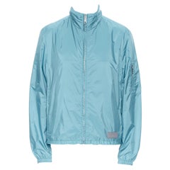 new PRADA Nylon teal blue rubber logo badge zip front light shell jacket IT50