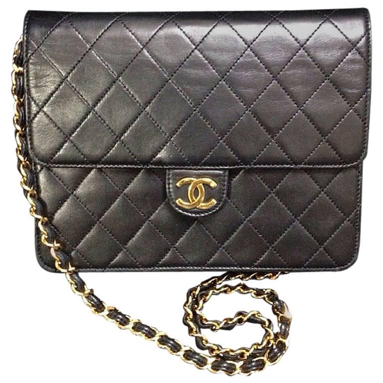 Vintage CHANEL black quilted lambskin classic 2.55 shoulder purse with golden CC