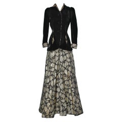 Evening long skirt-suit in black velvet and gold lurex brocade dress