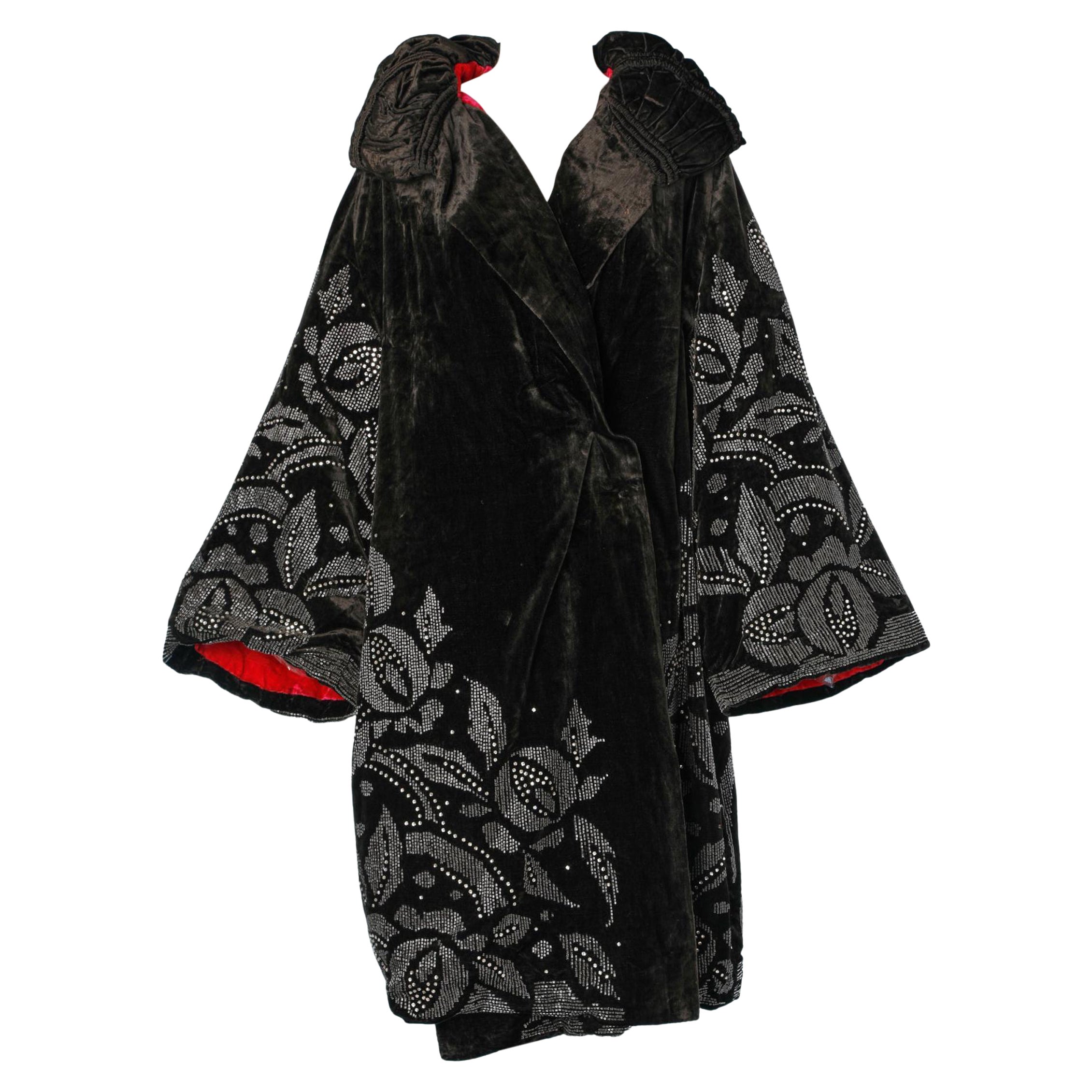 Black silk velvet Opera coat with beads and rhinestone embroidered Circa 1920  For Sale