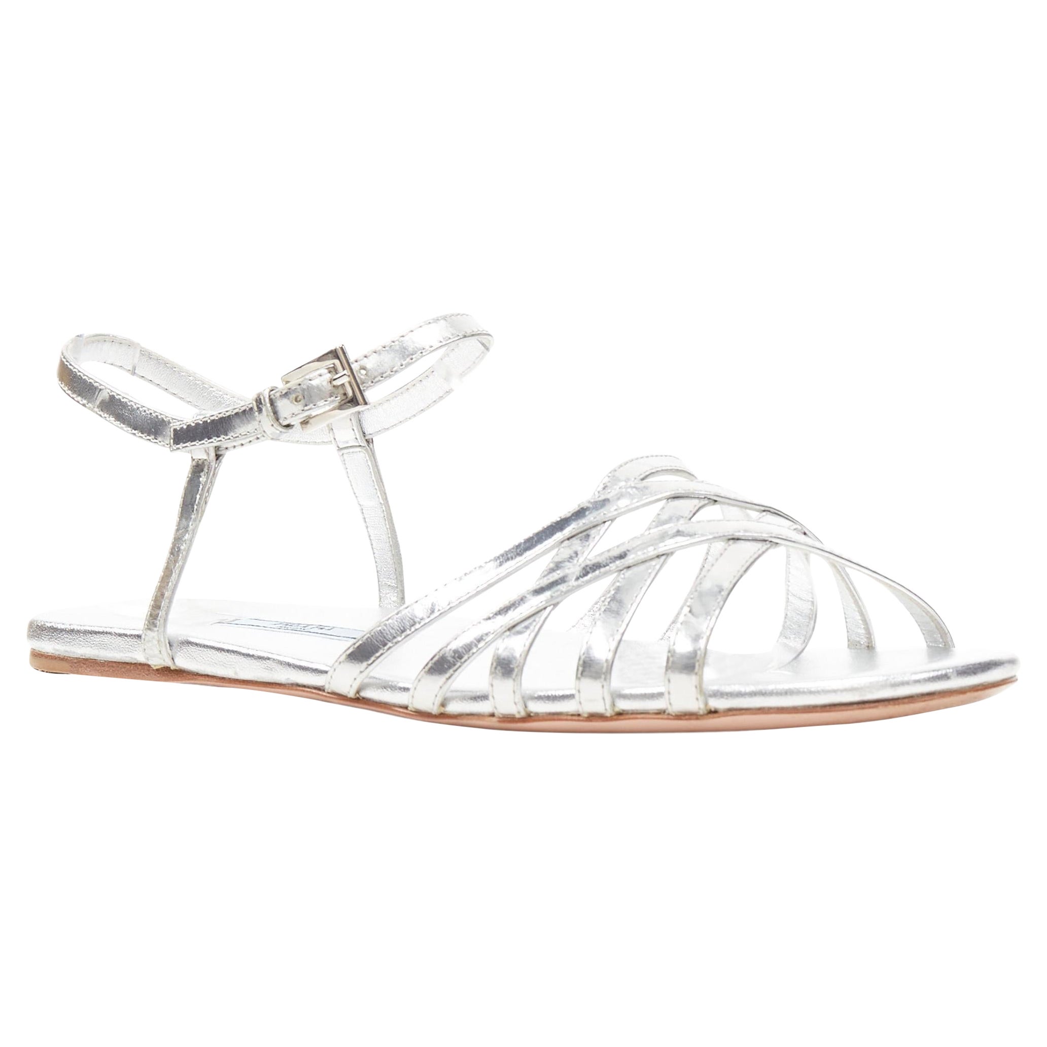 Dingy efter skole Romantik PRADA metallic silver criss cross strap open toe ankle strap flat sandals EU37.5 For Sale at 1stDibs | metallic flat sandals, silver flat sandals Dingy efter skole Romantik PRADA metallic silver criss cross strap open toe ankle strap flat sandals EU37.5 For Sale at 1stDibs | metallic flat sandals, silver flat sandals