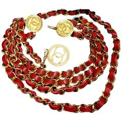 Mint. 80's Vintage CHANEL red leather chain belt with golden CC charms. 