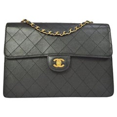 CHANEL Sac à bandoulière de soirée classique Jumbo à rabat en cuir texturé noir et or