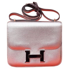 Exceptional Hermès Mini Constance Metallic Silver Chevre Leather Phw 18 cm 