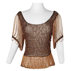 Knit lurex and chains copper color with short sleeves Loris Azzaro