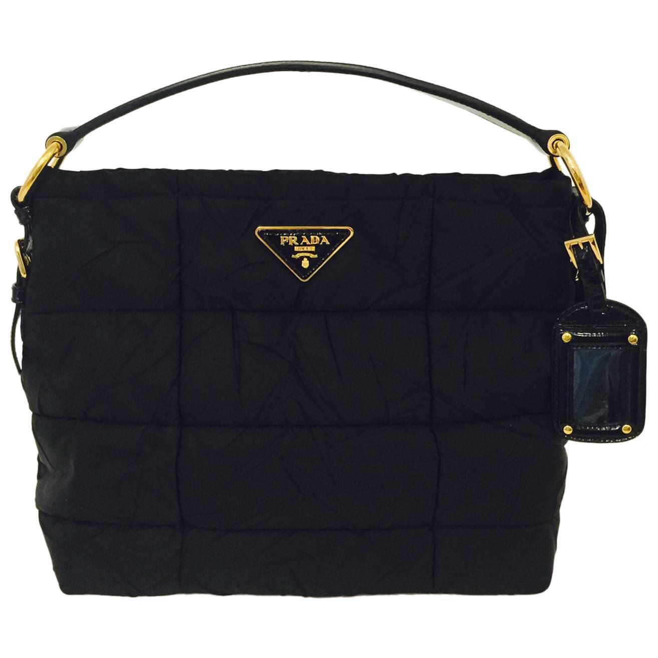 Prada Black Quilted Nylon Handbag With Patent Leather Handle and Brass Hardware For Sale at 1stdibs