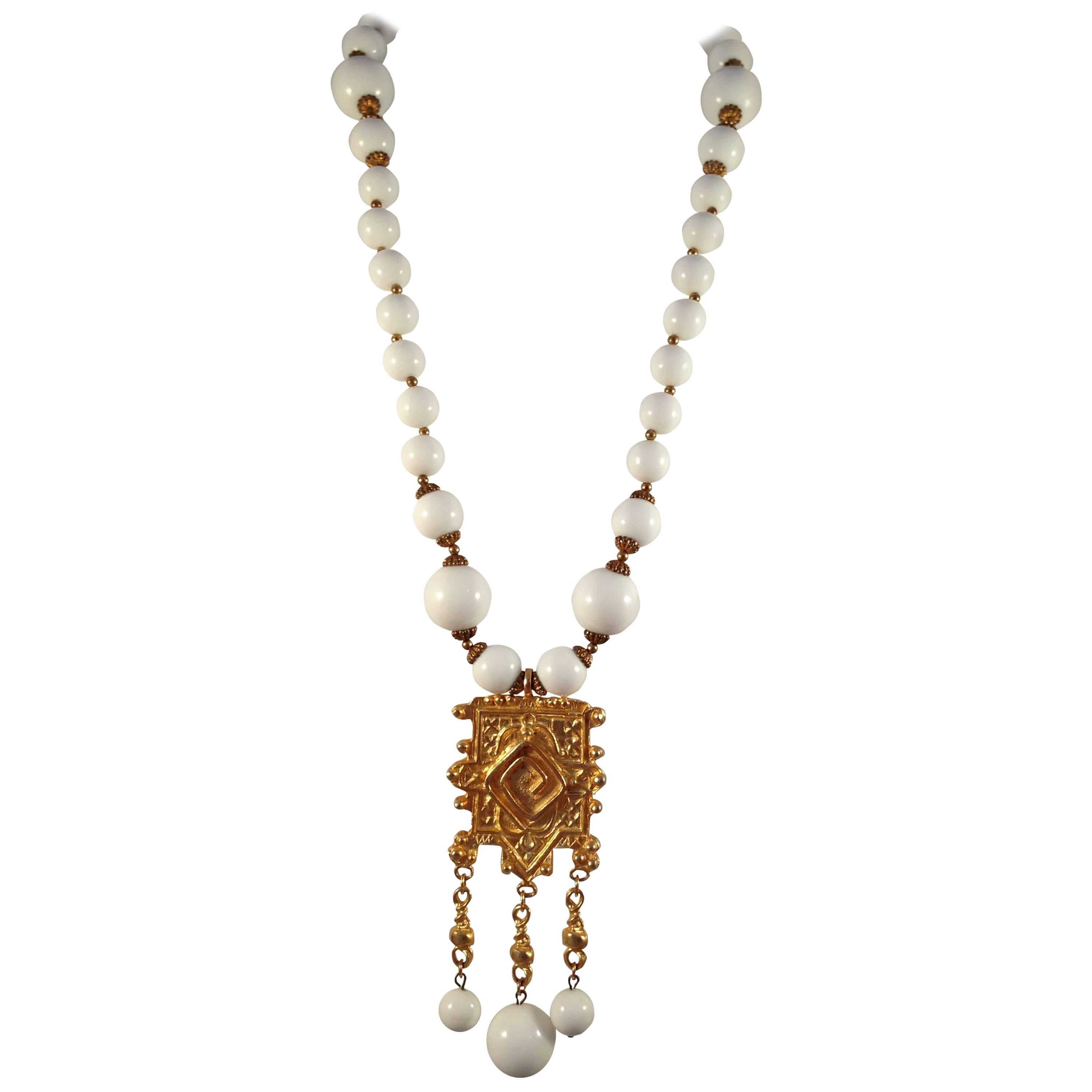 1960s Cadoro White Beaded Necklace With Large Gold Tone Pendant For Sale
