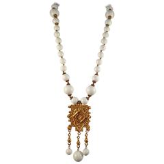 1960s Cadoro White Beaded Necklace With Large Gold Tone Pendant